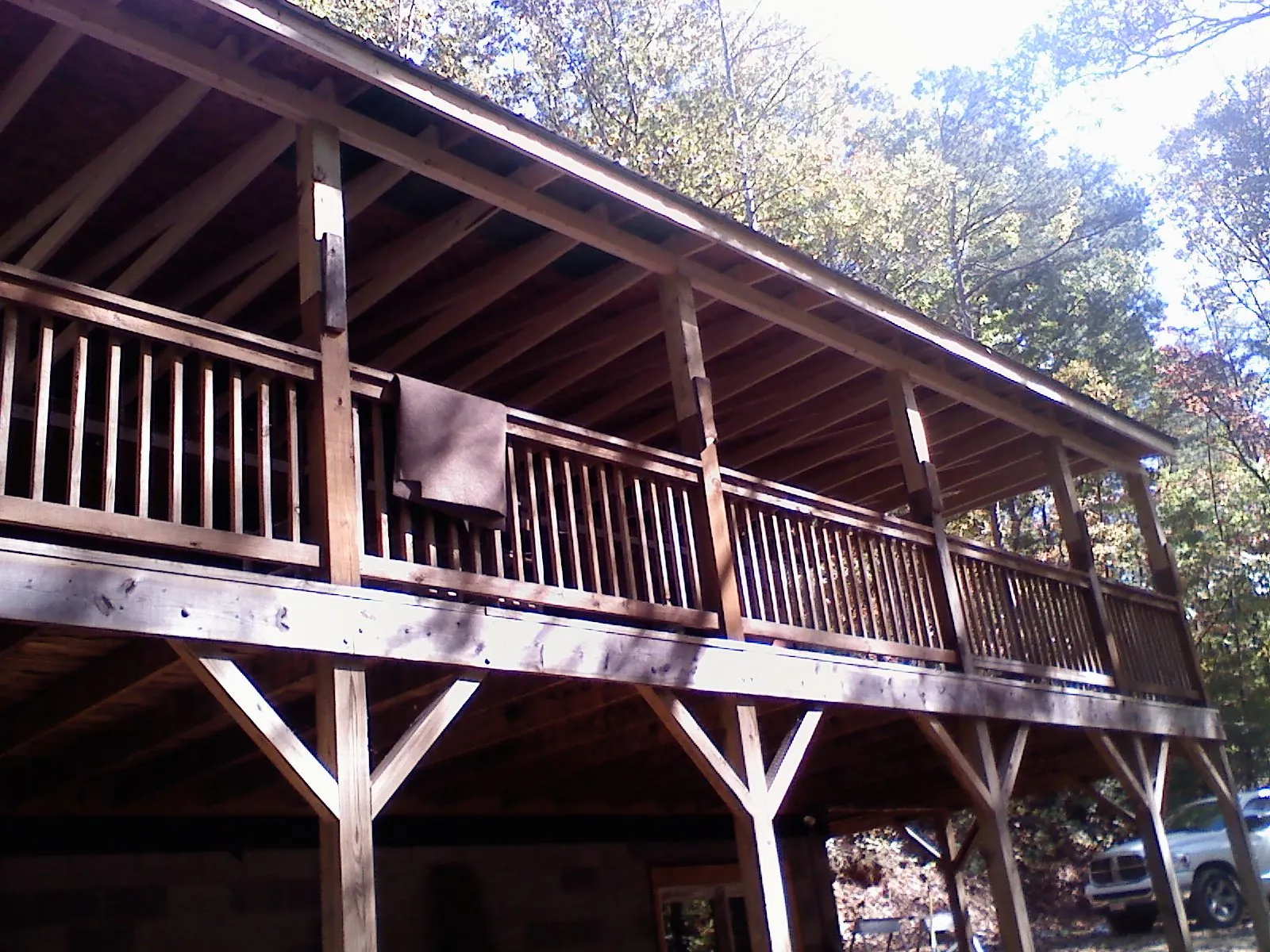 Timber framing under a new elevated porch and deck — Roof Leak Repair in East Bethany by Roofing Brothers